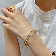 Elegant Gold-Tone Crystal Stone Bracelet – Luxury Layered Bangle